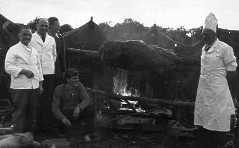 Barbecue mid 50's:
I joined in 57 and I would have known if that much meat was on offer in my time.
The chefs look familiar - I think they are the Poles who worked at the hostel.