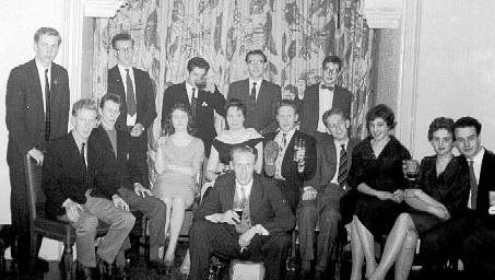 The caving club Dinner and Expedition to Cornwall.
This was the one and only Caving Club annual dinner 1957 or 8.
I'm top right with my pretentious bow tie. Com Payne is top middle.  Ginge Hordell is resting his
shoe on Bob (Nob) Yarnold's shoulder (joint secretaries).  Pete Todd, far left, proudly wears the
'George Medal' presented to him by MSG for conspicuous gallantry. It was his dearest wish to get one
after the Peak cavern incident. Also extreme left is Hugh Nightingale.  In front of him ?? next to him Jim Gregory (possibly)