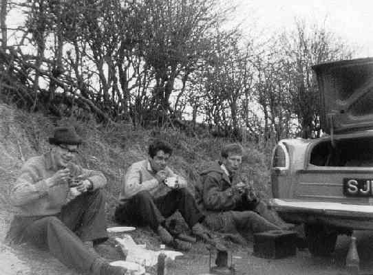 These days our children go back-packing in Outer Mongolia.  Cornwall was far enough in 1958 and meal times were primitive affairs.  L to R - Me, Com Payne & Reg Powell.  Reg insisted on taking his air rifle with him but never shot a thing as far as I know.