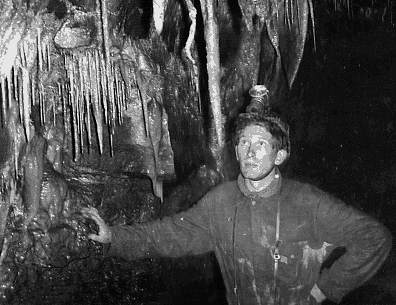 Reg Powell contemplates the meaning of life in Swildons (Mendips)