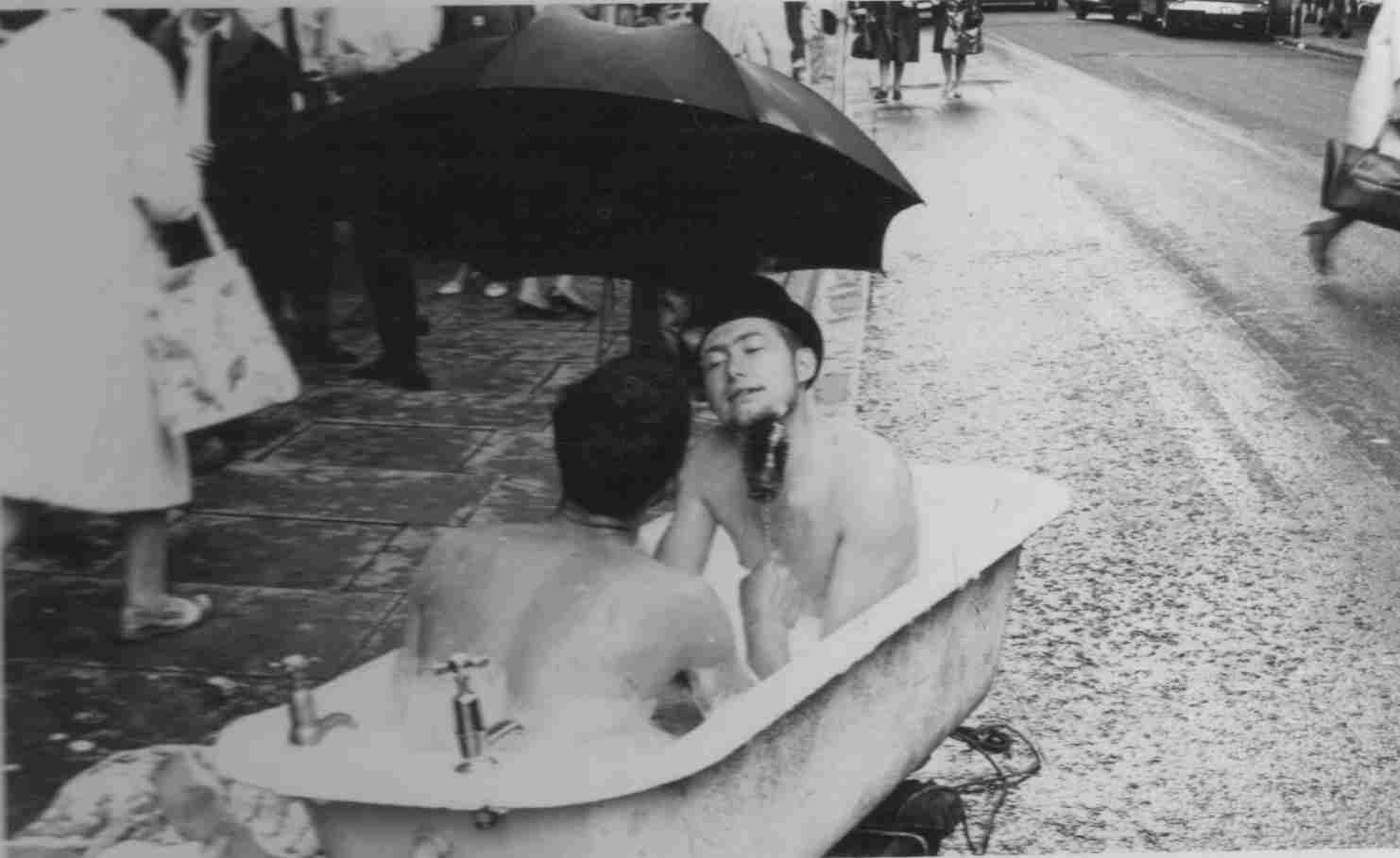Roger Thornburn and ??? bathing outside Wollies